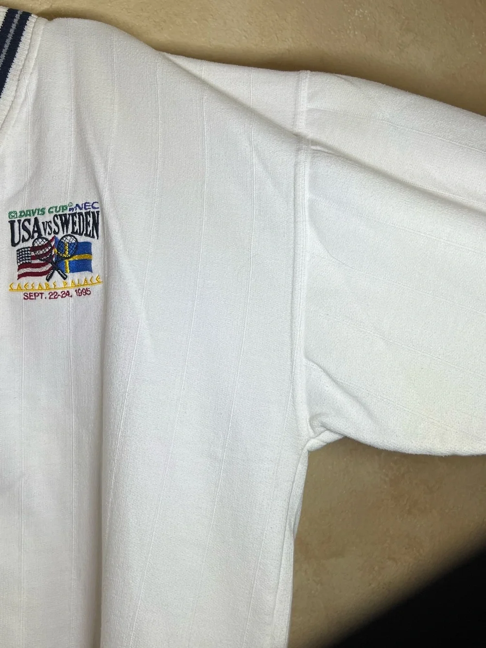 1995 Vintage Mens White V‑Neck Striped Trim Sweater - USA vs Sweden Graphic